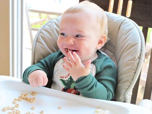 baby eating cereal