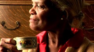 black woman drinking tea