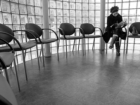 girl reading waiting room